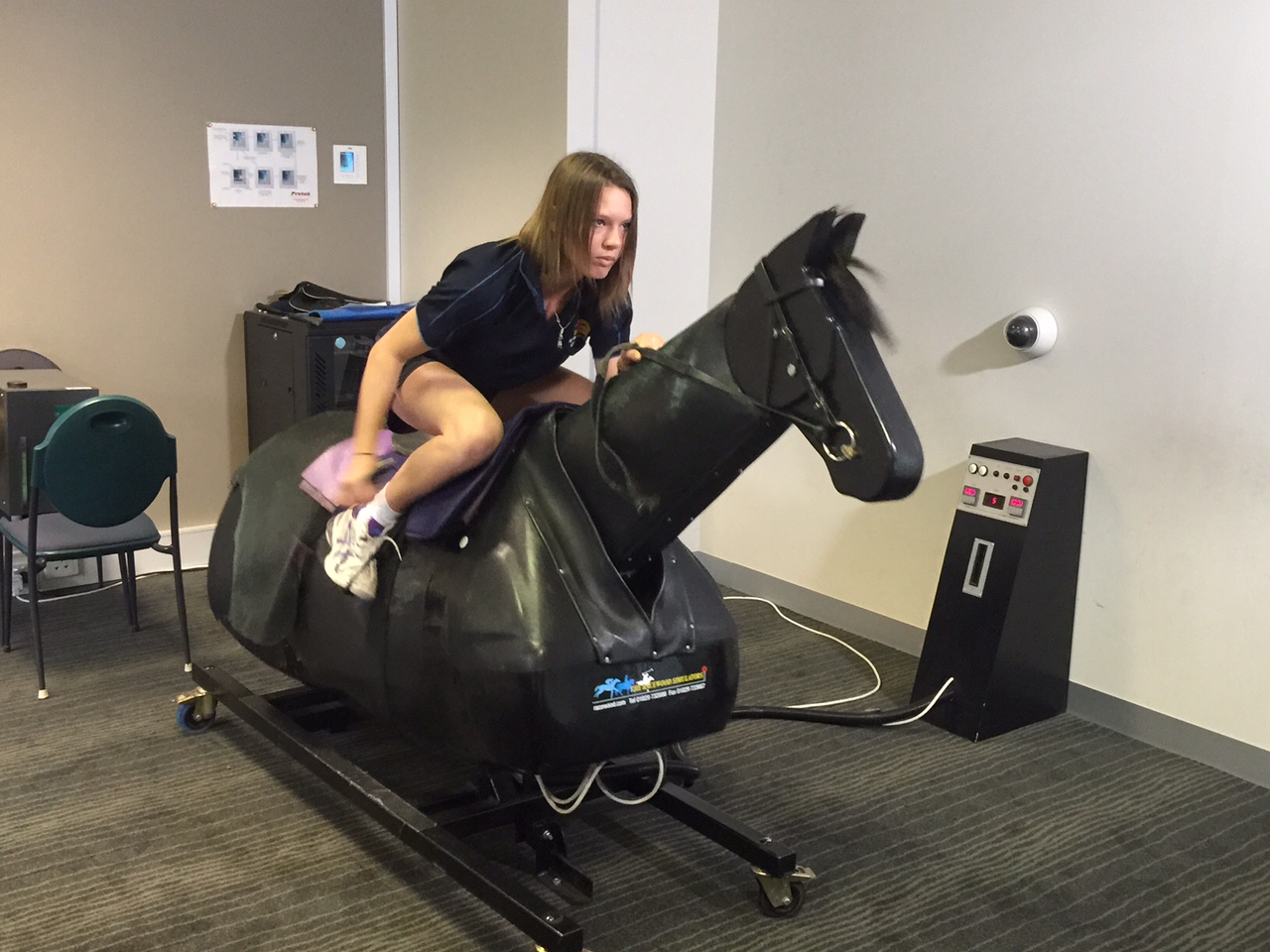 stephanie thornton on mechanical horse at racing victoria
